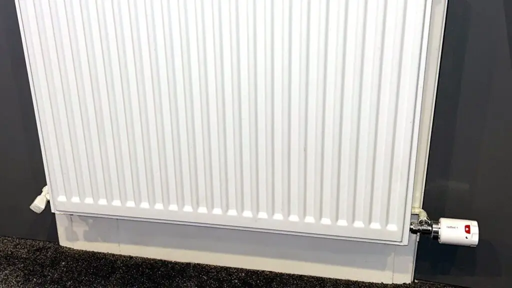 Modern house with a heat pump in the garden